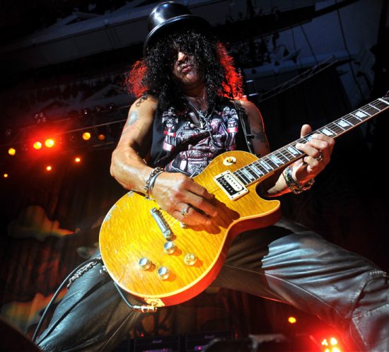 Photograph of Slash on stage at Victoria Hall, Hanley
